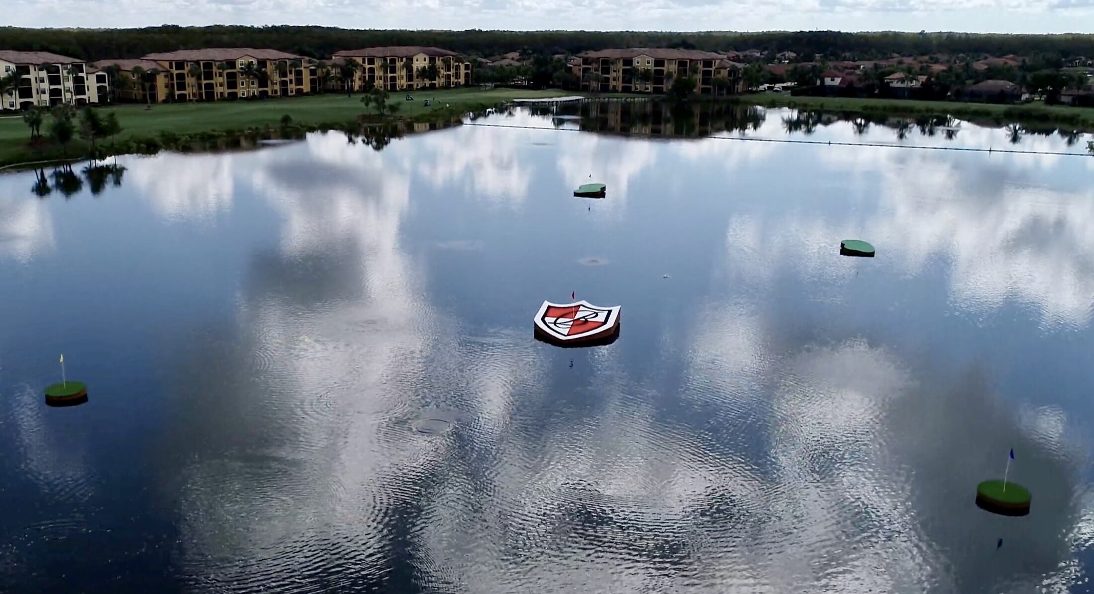 Shield image in middle of pond - high shot